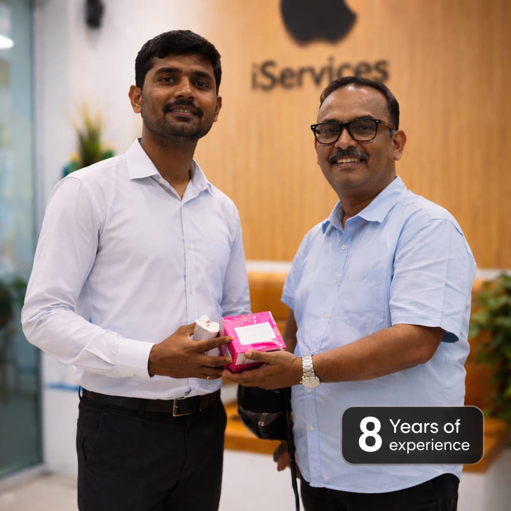 iServices Centre team at the Hyderabad workshop handing over a repaired device